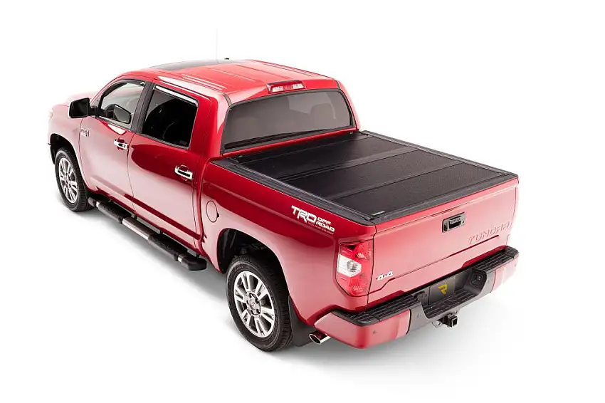 BAK Industries BAKFlip G2 Hard Folding Truck Bed Cover - Rail Mounts Near Top of Bed Rail for Rails Can Be Lowered Using Drop Down Brackets - 2007-2021 Toyota Tundra 5' 6" Bed without Deck Rail System without Trail Special Edition Storage Boxes 226409