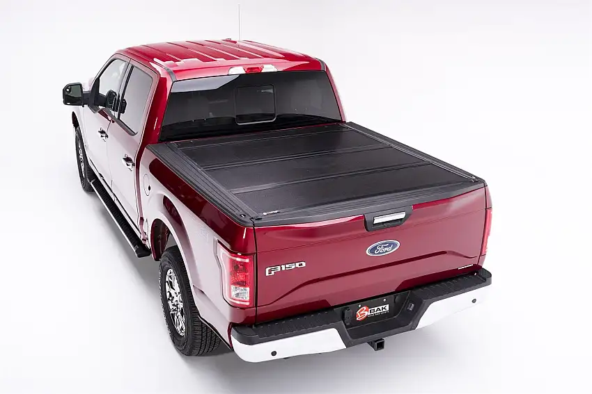 BAK Industries BAKFlip F1 Hard Folding Truck Bed Cover for 2004-2014 Ford F-150 5' 7" Bed without Cargo Management System 772309
